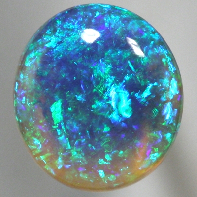 SOLID CRYSTAL OPAL Blue - green Harlequin pattern with greens and blue jumping brightly. With VIDEO